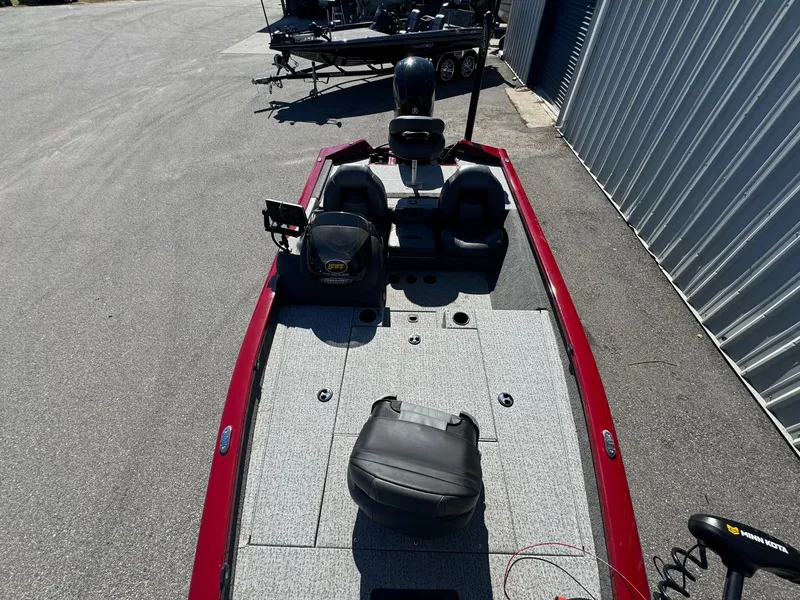 Slide: The Image of 2020 Bass Tracker 175 TF fishing boat with red trim and seating. - 2