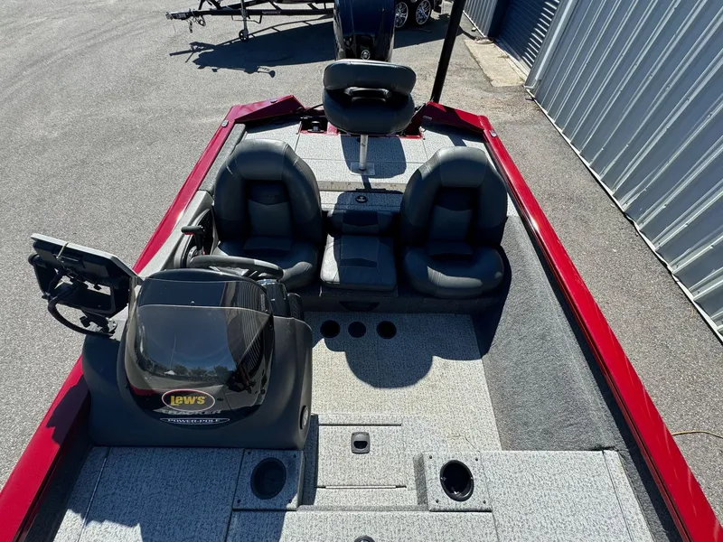 Slide: The Image of 2020 Bass Tracker 175 TF boat interior with seating and control panel. - 3