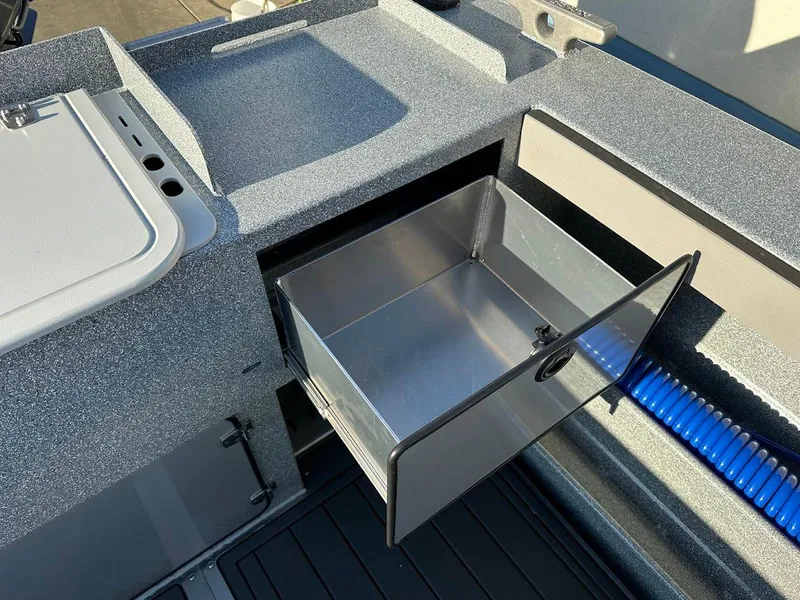 Slide: The Image of Open storage compartment on 2025 KingFisher 2625 Coastal Express boat. - 20