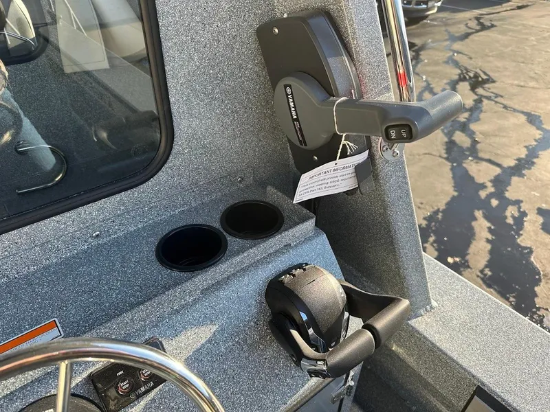 Slide: The Image of 2025 KingFisher 2625 Coastal Express boat controls and dashboard detail. - 27