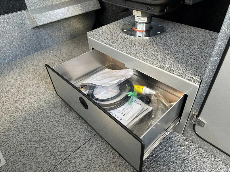 Slide: The Image of Open storage drawer in 2025 KingFisher 2625 Coastal Express boat interior. - 45