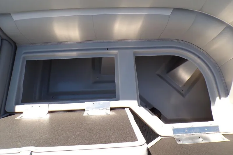 Slide: The Image of Interior storage compartments of 2025 Godfrey Xperience 2286 SBX Sport Tube boat. - 12