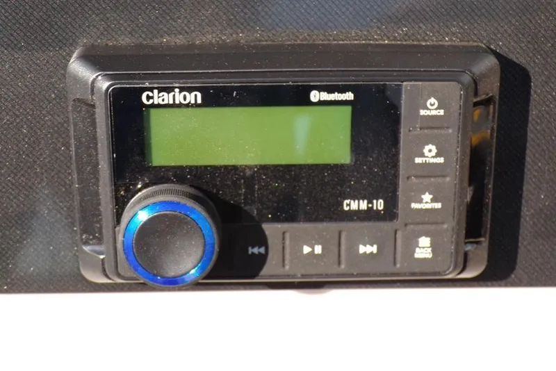 Slide: The Image of Clarion CMM-10 Bluetooth stereo on 2025 Godfrey Xperience 2286 SBX Sport Tube. - 16
