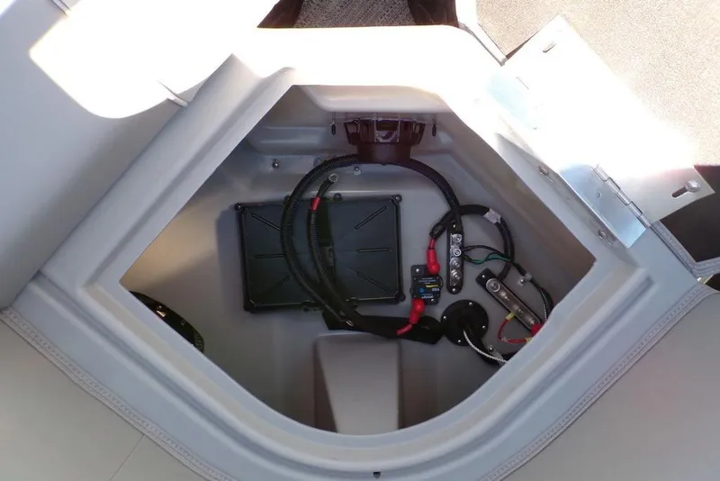 Slide: The Image of 2025 Godfrey Xperience 2286 SBX Sport Tube electrical compartment with wiring and components. - 21