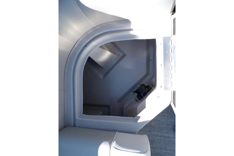 Slide: The Image of Interior storage compartment of 2025 Godfrey Xperience 2286 SBX Sport Tube boat. - 22