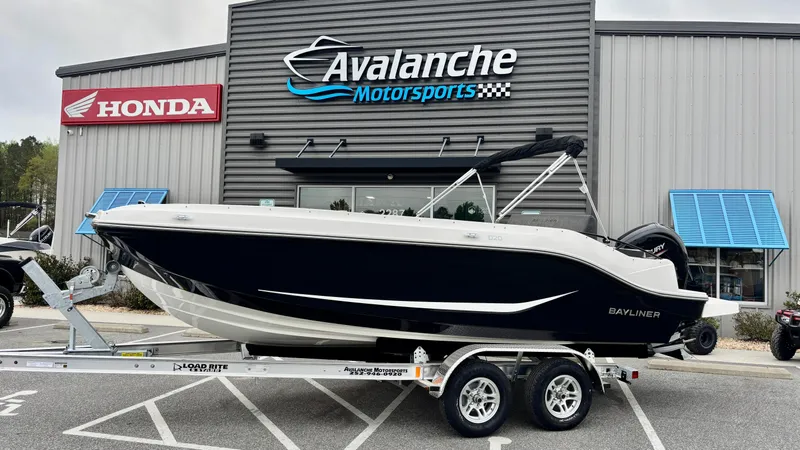 The Image of 2025 Bayliner D20 boat on trailer at Avalanche Motorsports dealership. - 0