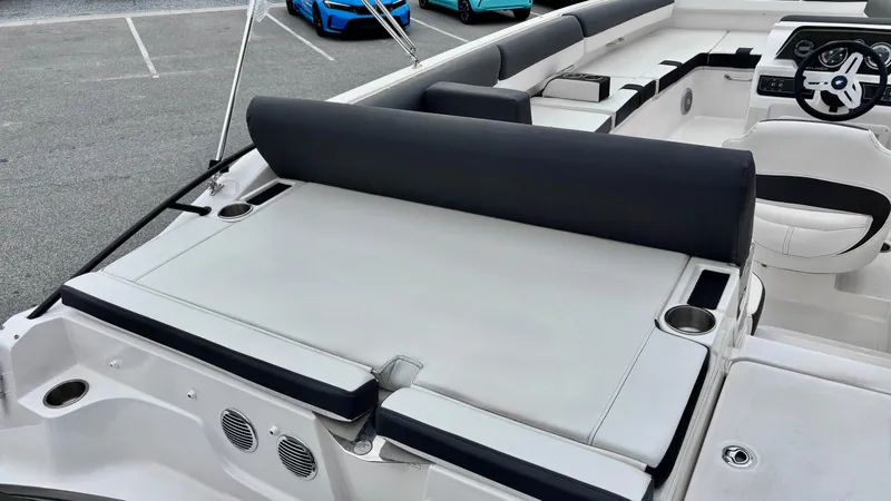 Slide: The Image of 2025 Bayliner D20 boat interior with cushioned seating and modern design. - 7