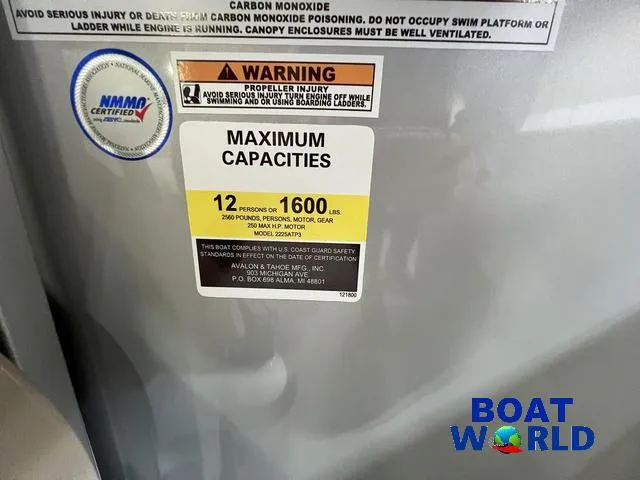Slide: The Image of Warning label on 2025 Tahoe LTZ 2385 Elite Cruise Tritoon, max capacity 12 people or 1600 lbs. - 14