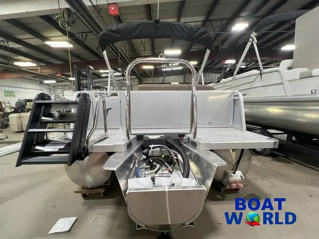 Slide: The Image of 2025 Tahoe LTZ 2385 Elite Cruise Tritoon with Honda 4-Stroke EFI in showroom. - 25