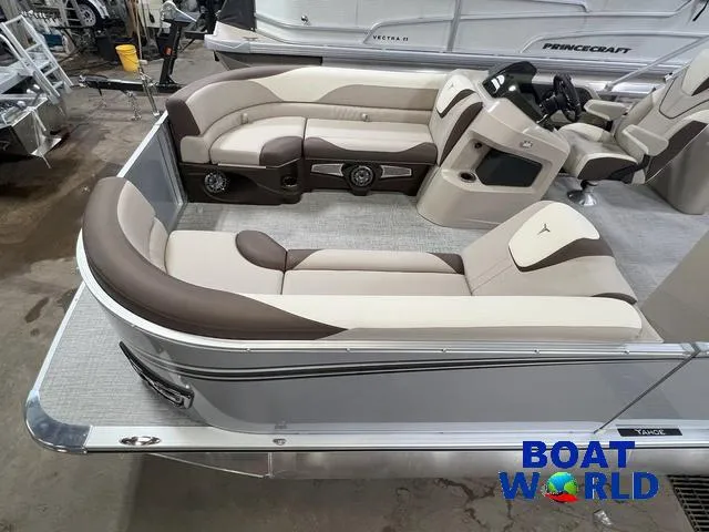 Slide: The Image of 2025 Tahoe LTZ 2385 Elite Cruise Tritoon interior with luxurious seating and modern design. - 3