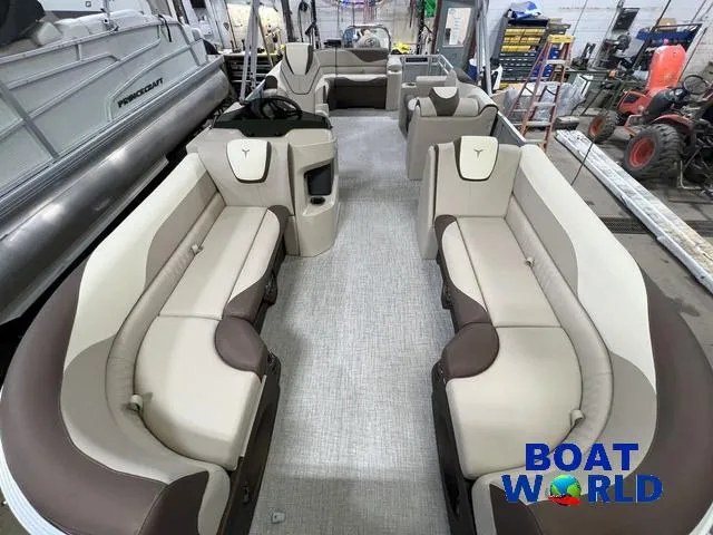Slide: The Image of 2025 Tahoe LTZ 2385 Elite Cruise Tritoon interior with luxurious seating and modern design. - 6