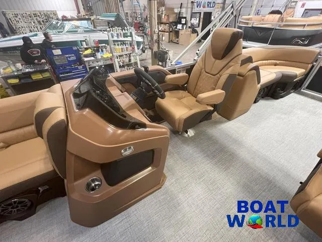 Slide: The Image of 2025 Tahoe LTZ 2385 Quad Lounge interior with Honda 4-Stroke EFI, showcased at Boat World. - 10