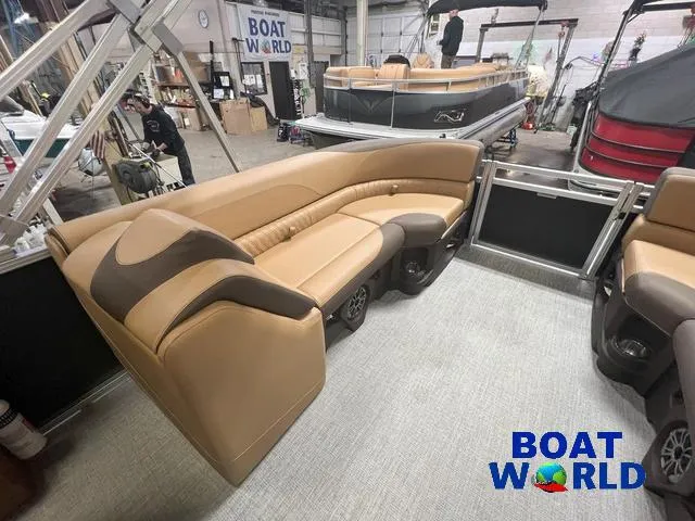 Slide: The Image of 2025 Tahoe LTZ 2385 Quad Lounge interior at Boat World showroom. - 15