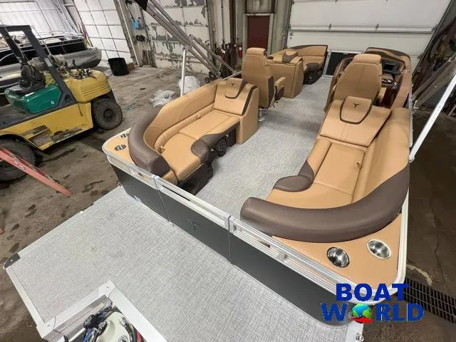 Slide: The Image of 2025 Tahoe LTZ 2385 Quad Lounge with Honda 4-Stroke EFI, luxurious interior view. - 23