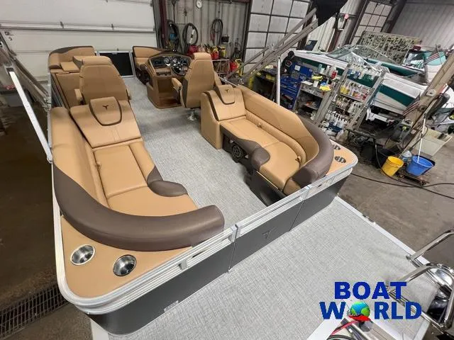 Slide: The Image of 2025 Tahoe LTZ 2385 Quad Lounge with Honda 4-Stroke EFI, luxurious interior view. - 24