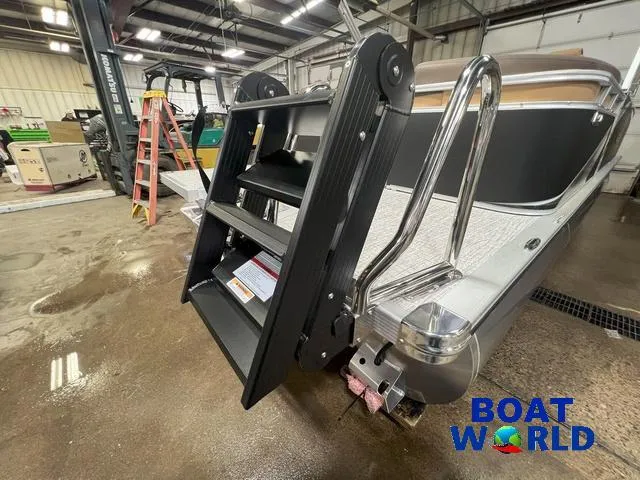 Slide: The Image of 2025 Tahoe LTZ 2385 Quad Lounge with Honda 4-Stroke EFI in showroom. - 26