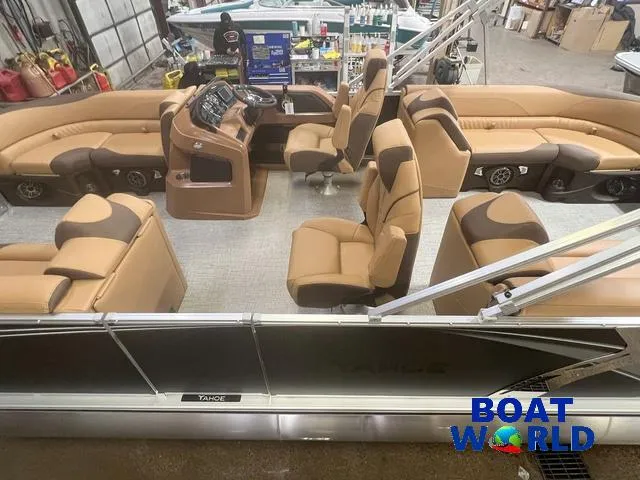 Slide: The Image of 2025 Tahoe LTZ 2385 Quad Lounge with Honda 4-Stroke EFI, luxurious interior, Boat World showroom. - 4