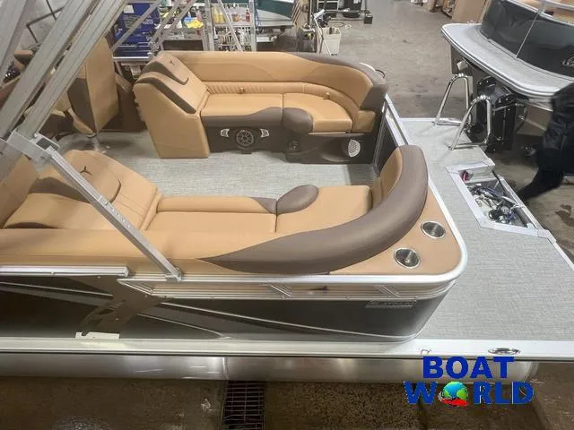 Slide: The Image of 2025 Tahoe LTZ 2385 Quad Lounge with Honda 4-Stroke EFI, featuring luxurious seating. - 5