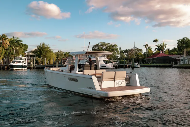 Slide: The Image of 2022 Fjord 38 Open yacht cruising on a scenic waterway. - 16