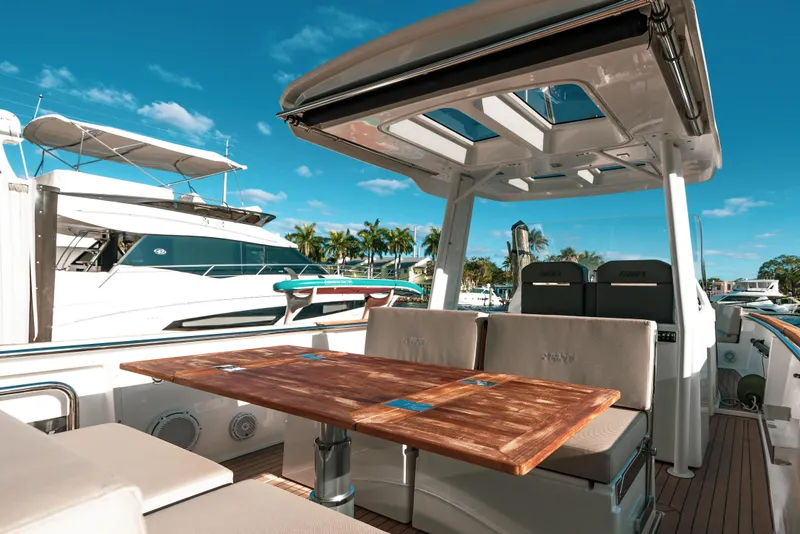 Slide: The Image of 2022 Fjord 38 Open yacht with spacious deck and seating area. - 27