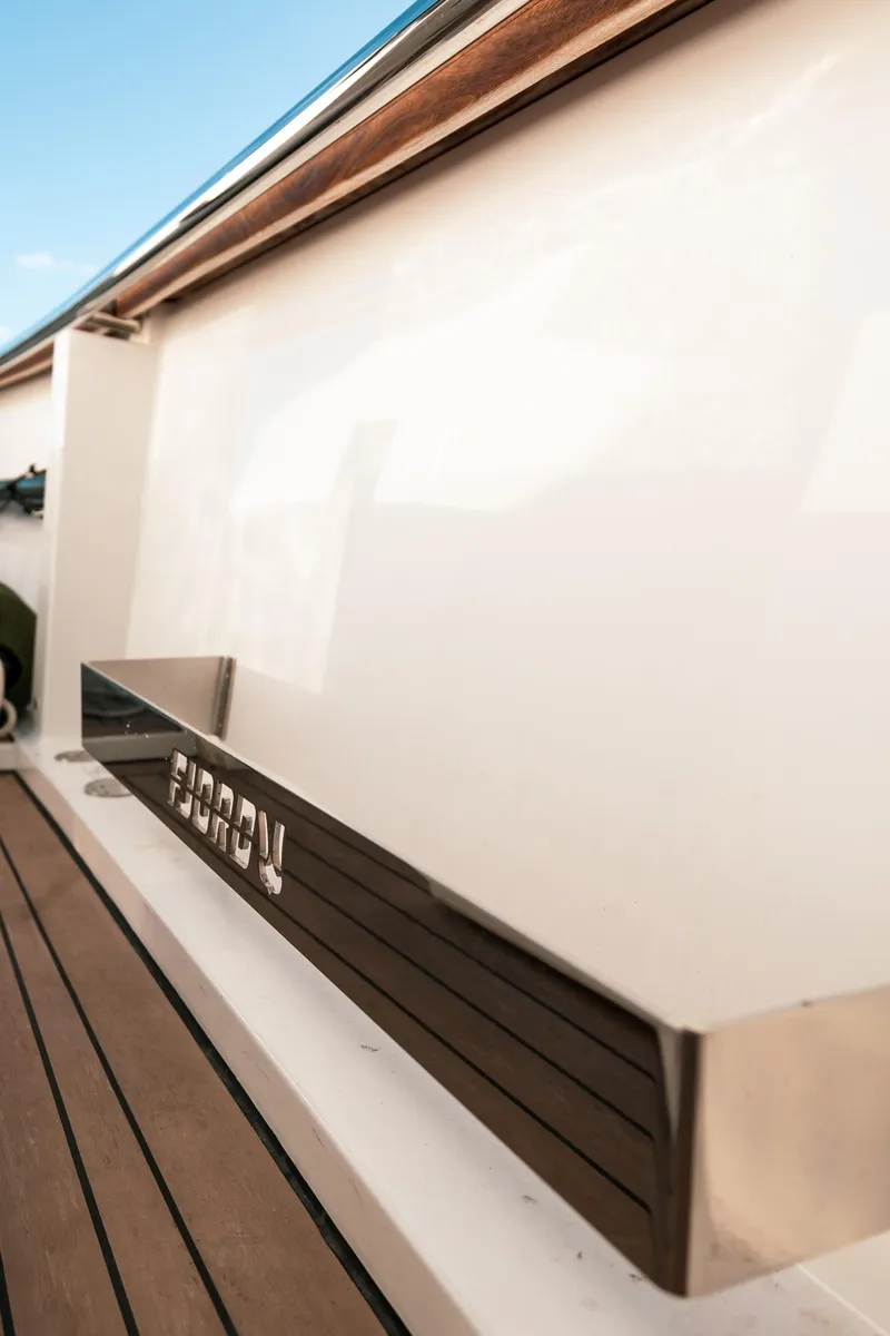 Slide: The Image of 2022 Fjord 38 Open yacht, sleek design, wooden deck detail. - 37