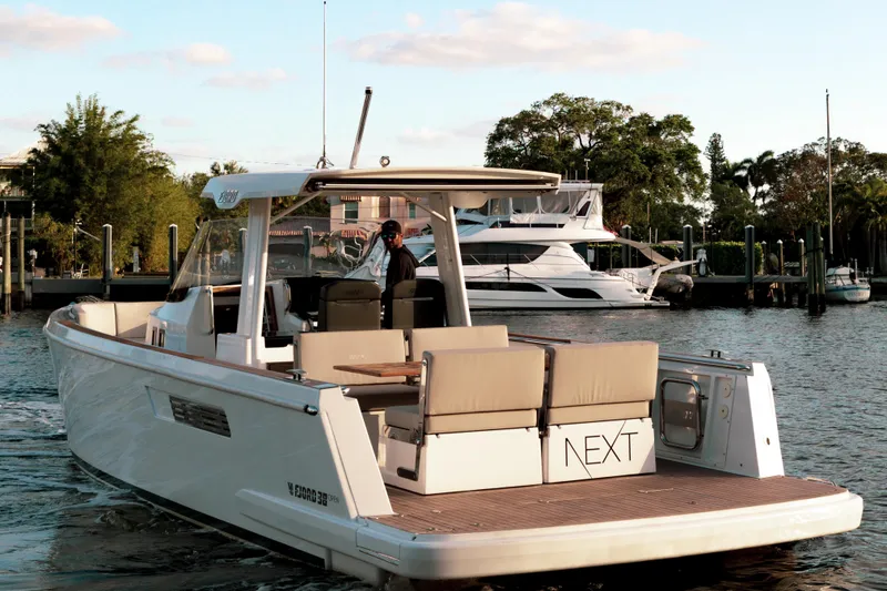 Slide: The Image of 2022 Fjord 38 Open yacht cruising on a serene waterway. - 5