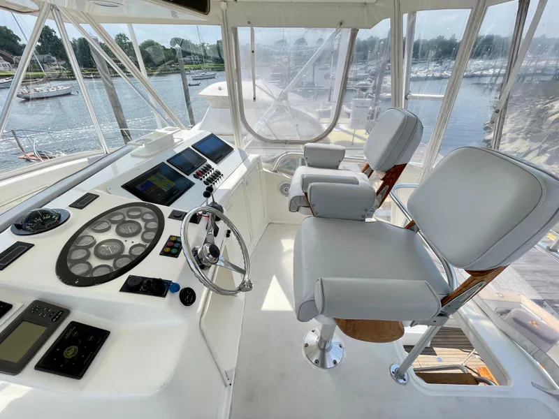 Slide: The Image of Interior helm of 2000 Ocean Yachts 43 Super Sport with modern controls and seating. - 20