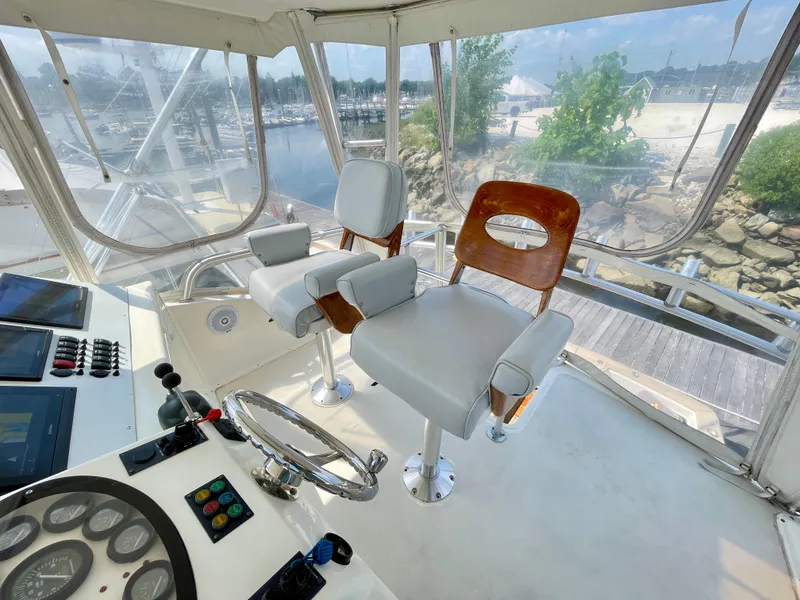 Slide: The Image of Interior of 2000 Ocean Yachts 43 Super Sport with helm and seating. - 24