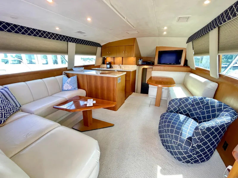 Slide: The Image of Luxurious interior of 2000 Ocean Yachts 43 Super Sport with elegant seating and modern amenities. - 4