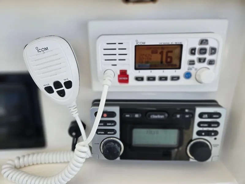 Slide: The Image of ICOM marine radio equipment on 2004 Marlago FS35 boat dashboard. - 29