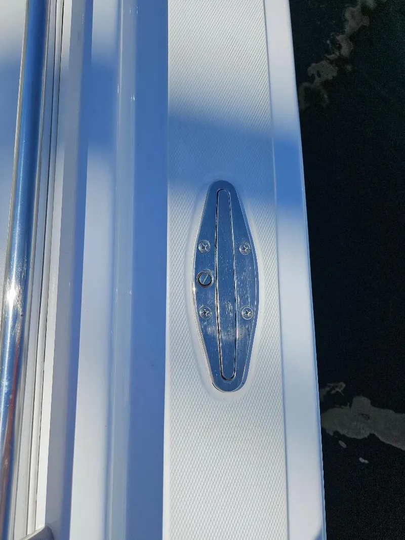 Slide: The Image of Close-up of 2004 Marlago FS35 boat cleat on deck. - 43