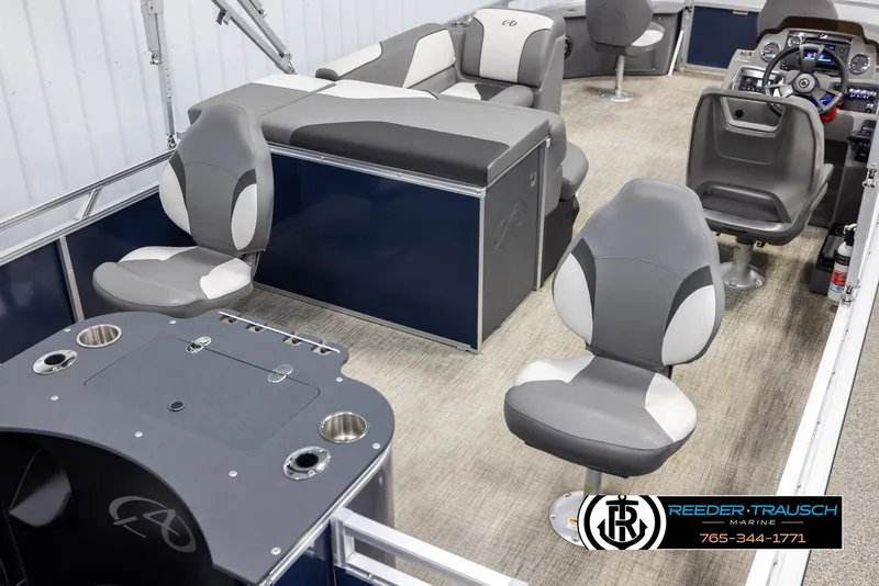 Slide: The Image of 2024 Avalon VEN QF boat interior with modern seating and control panel. - 12