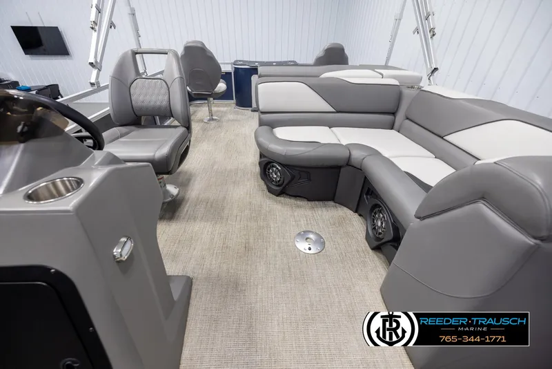 Slide: The Image of 2024 Avalon VEN QF boat interior with gray seating and modern design. - 14