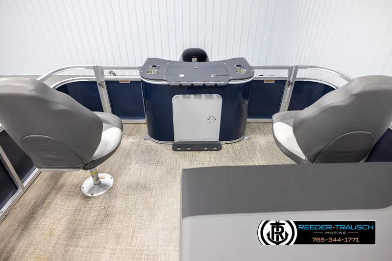 Slide: The Image of 2024 Avalon VEN QF boat interior with seating and control panel. - 15