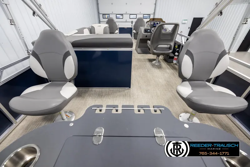 Slide: The Image of 2024 Avalon VEN QF boat interior with gray seating and modern design. - 16