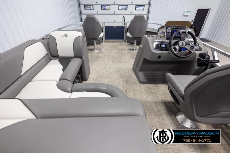 Slide: The Image of 2024 Avalon VEN QF boat interior with modern seating and control panel. - 17