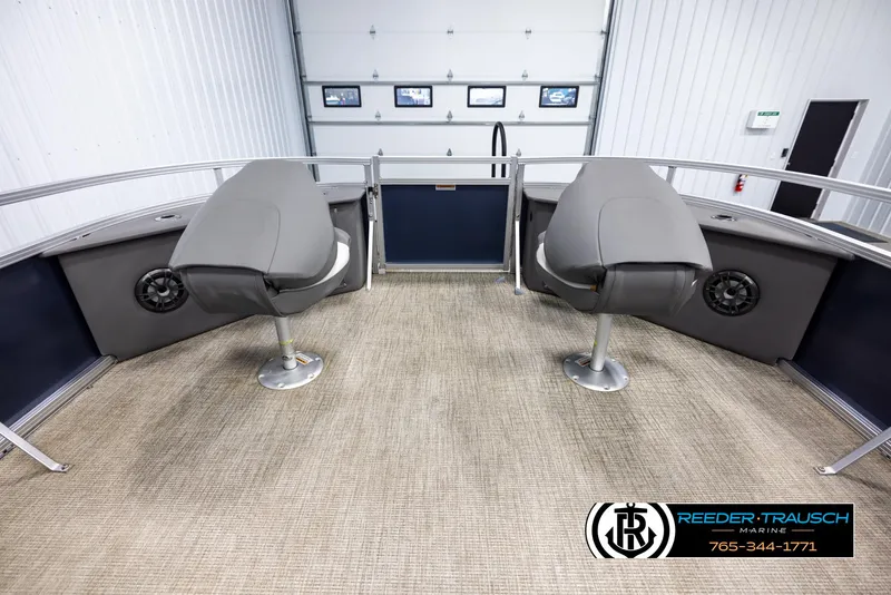 Slide: The Image of 2024 Avalon VEN QF boat interior with two gray seats and carpeted flooring. - 19