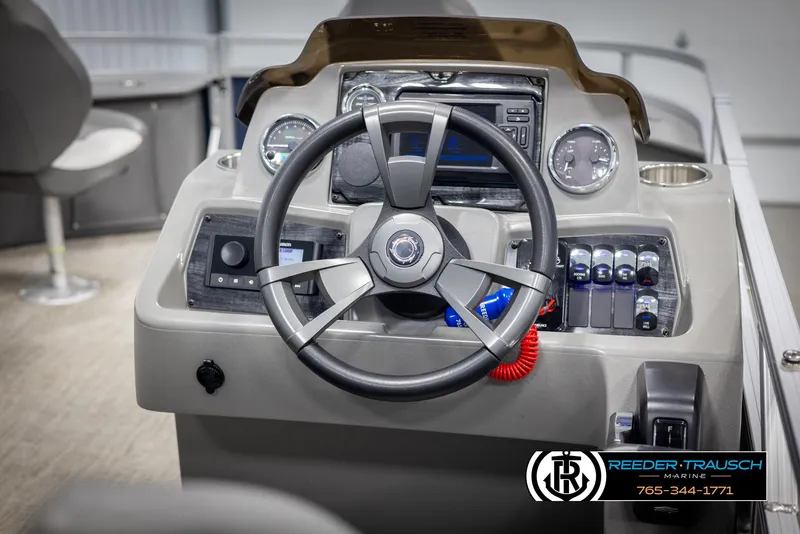 Slide: The Image of 2024 Avalon VEN QF boat dashboard with steering wheel and control panel. - 26