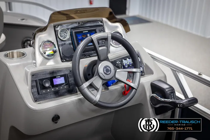 Slide: The Image of 2024 Avalon VEN QF boat dashboard with steering wheel and control panel. - 27