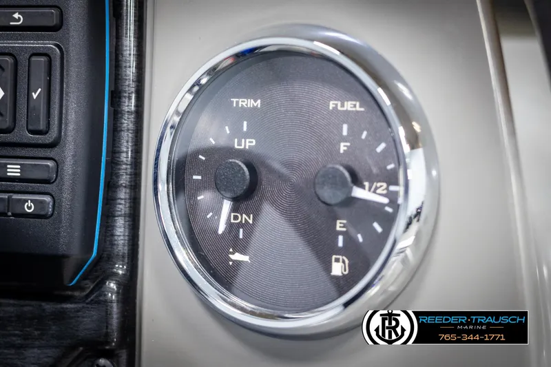 Slide: The Image of 2024 Avalon VEN QF dashboard gauge showing trim and fuel levels. - 34