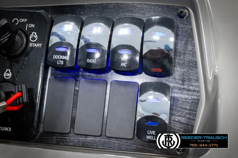 Slide: The Image of Control panel of 2024 Avalon VEN QF boat with labeled switches and logo. - 35