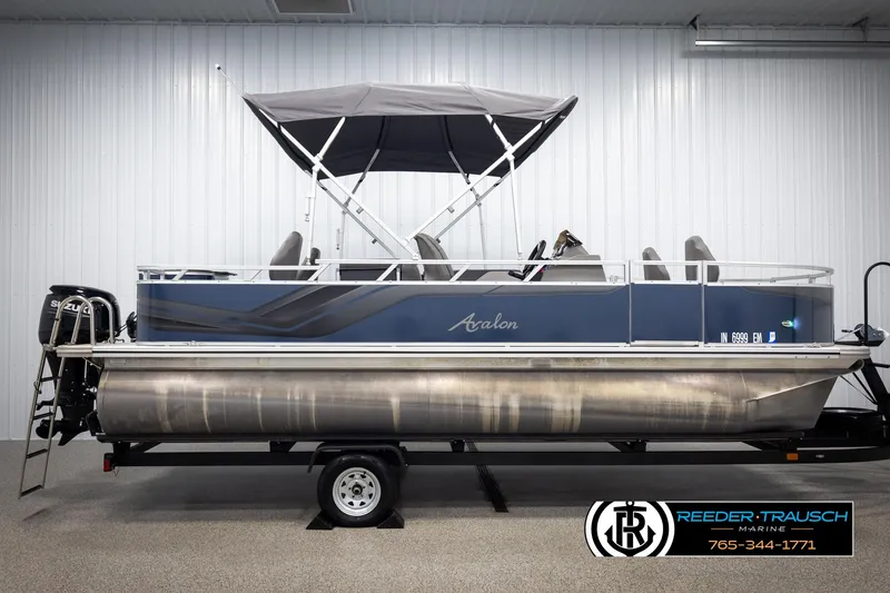 Slide: The Image of 2024 Avalon VEN QF pontoon boat with canopy in showroom. - 5