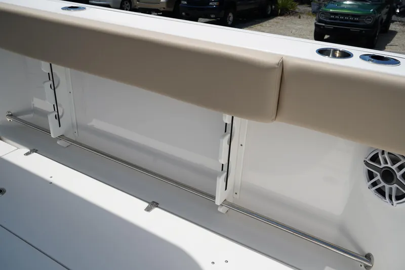 Slide: The Image of Open storage compartment on 2025 Edgewater 340CC boat, showcasing interior details. - 21