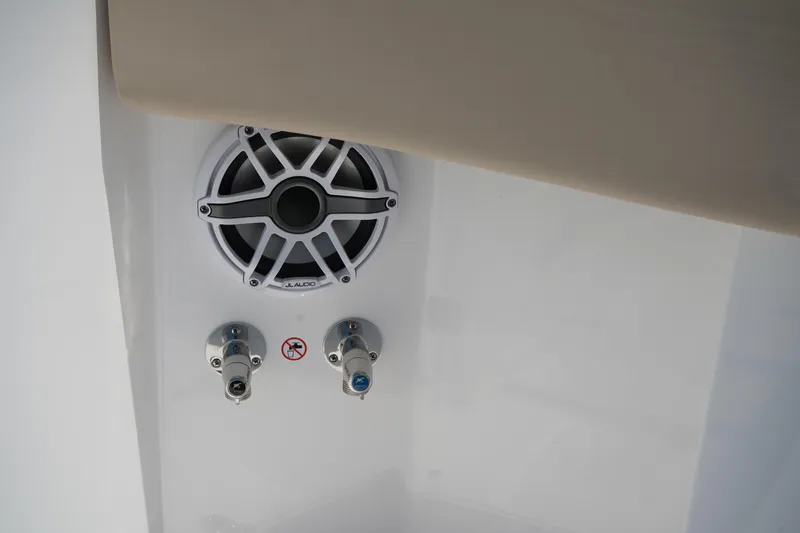 Slide: The Image of Storage compartment with Garmin equipment on Edgewater 340CC, 2025 model. - 39