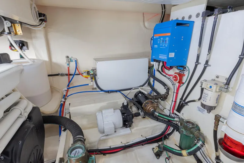 Slide: The Image of Engine room of 2017 Tiara Yachts 53 Coupe with electrical and mechanical components. - 31