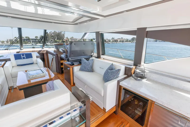 Slide: The Image of Luxurious interior of 2017 Tiara Yachts 53 Coupe with elegant seating and scenic water views. - 8