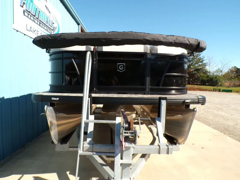Slide: The Image of 2025 Godfrey Sweetwater 2286 QS pontoon boat on trailer, front view. - 11
