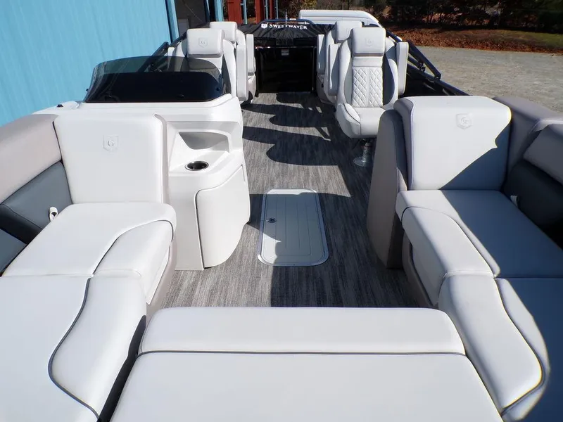 Slide: The Image of 2025 Godfrey Sweetwater 2286 QS boat interior with luxurious seating and modern design. - 17