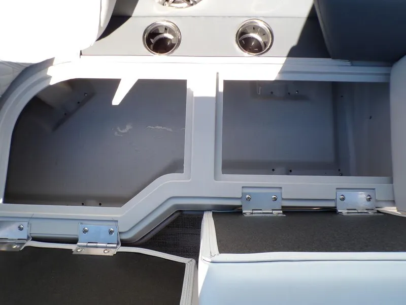Slide: The Image of Open storage compartment in 2025 Godfrey Sweetwater 2286 QS boat, showcasing interior space. - 26
