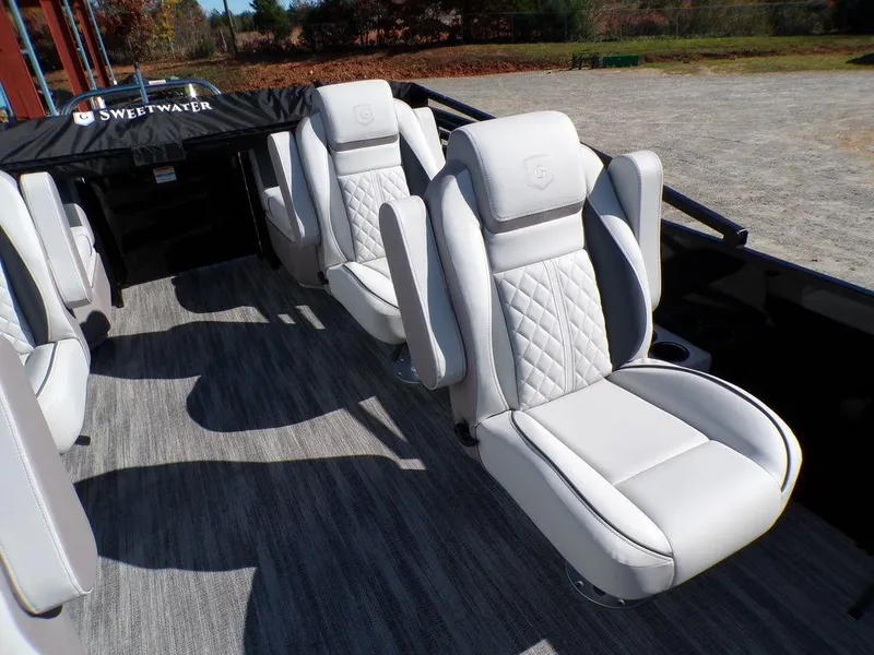 Slide: The Image of Luxurious seating on 2025 Godfrey Sweetwater 2286 QS pontoon boat, featuring elegant design and comfort. - 33